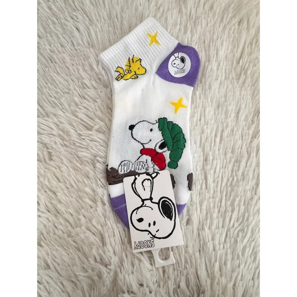 Snoopy ankle socks with Snoopy wearing green hat and red scarf and mummy costume